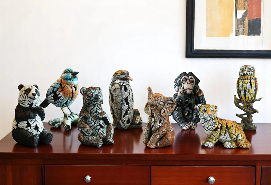 Set of Eight Brown White And Black Resin Panda, Bird, Bear, Monkey, Penguin