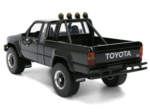 1985 Toyota SR5 Pickup Truck Black with Marty's Skateboard "Back to the Future" (1985) Movie "Hollywood Rides" Series 1/24 Diecast Model Car by Jada